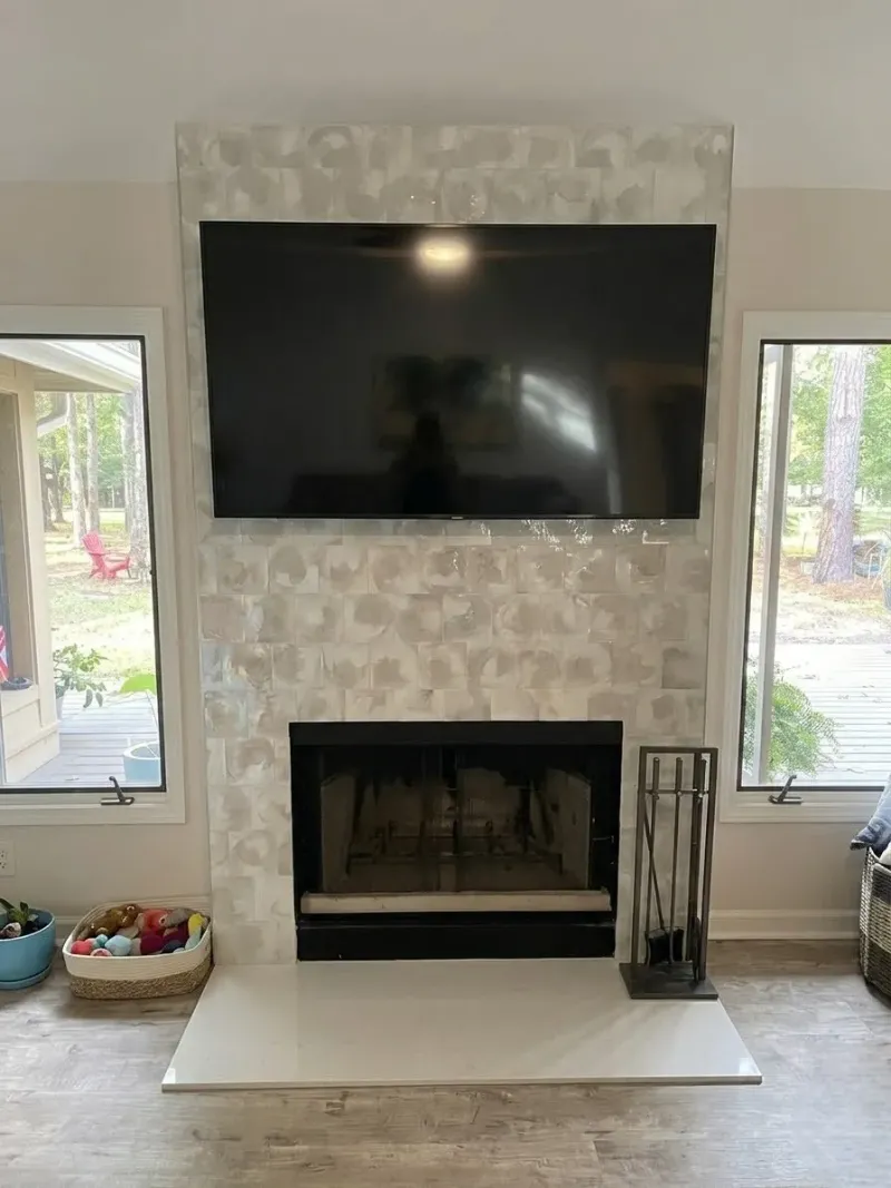 Fireplace after fixtures and accessories installation by Paez And More